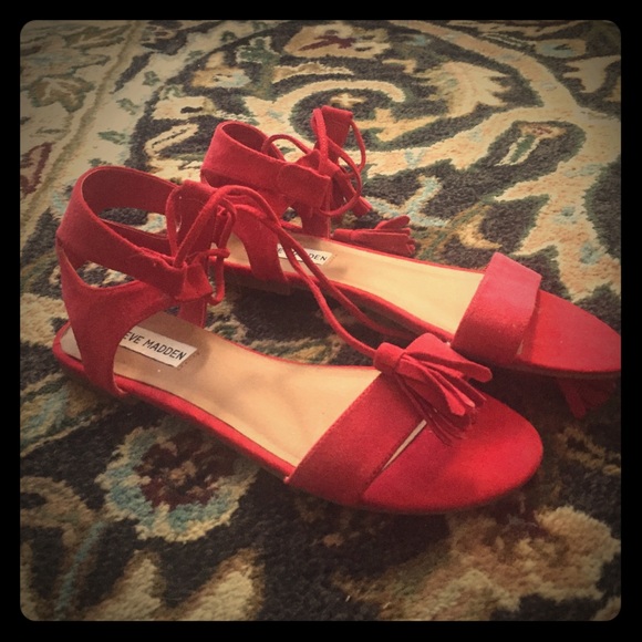 Never worn Steve Madden, red-tassel sandals. Sz7.5
