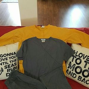 Grey scrub top, pants, and Rust Yellow lab jacket