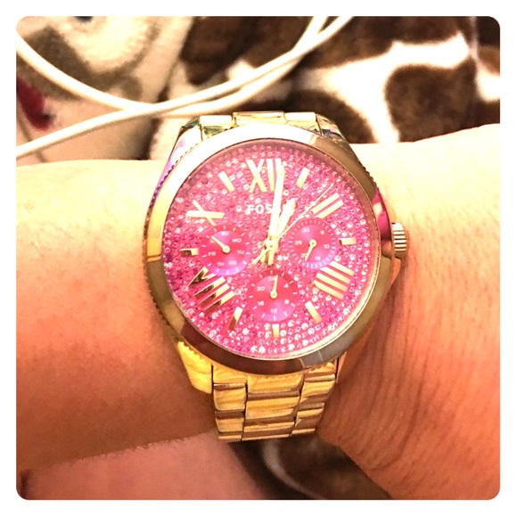 Ladies pink Gold tone & oversized Fossil watch.