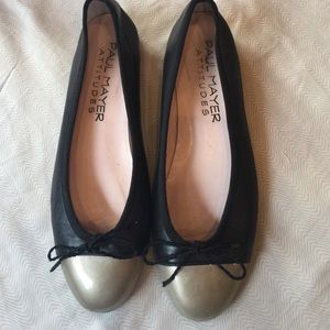 Black and bronze flats.  Paul Mayer!