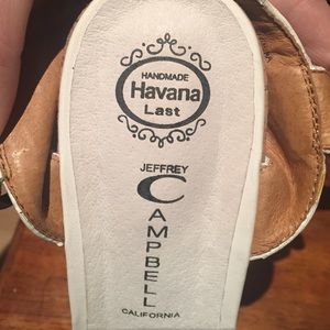 White platform Jeffrey Campbell sandels.
