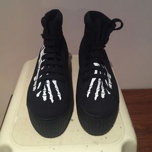 Black skeleton foot platform sneakers