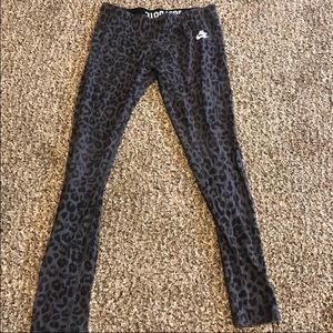 NIKE LG LEGGINGS USED CHEETAH PRINT