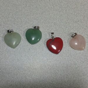 Set of 4 stone heart pendants