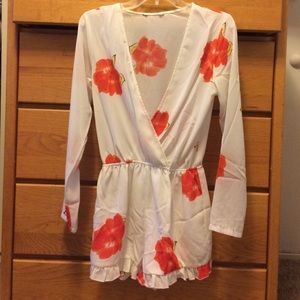 Romwe white romper with orange flowers