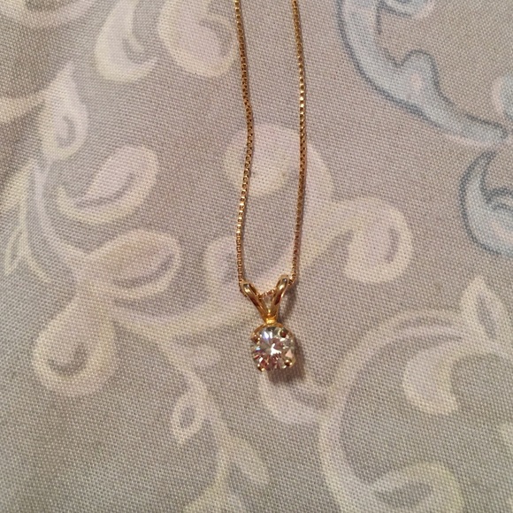 Diamond solitaire necklace.