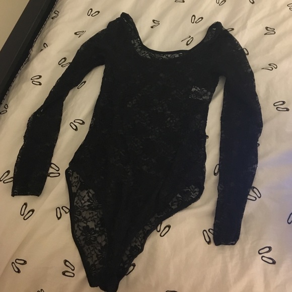 Lacy bodysuit never worn size m