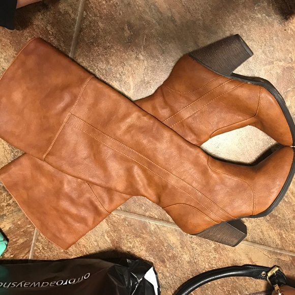 Brand new. Never worn knee high boots!