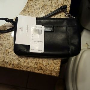 Couch wrist wallet brand new 100% authentic and ge