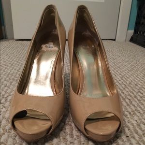 Nude peep-toe high heels