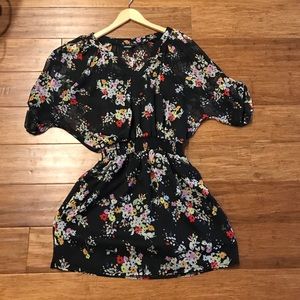 Express black with floral dress.