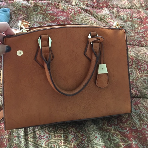 Brand new tan cross body bag.