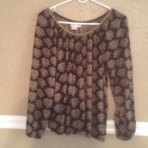 Long sleeve blouse. Rayon/ spandex material.