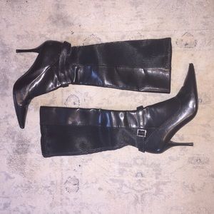 Knee high pointed leather boots