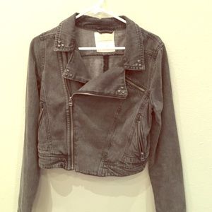 Black and studded denim motorcycle jacket