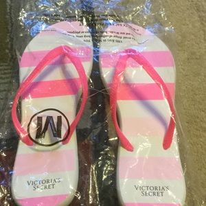 Victoria Secrets pink flip flops