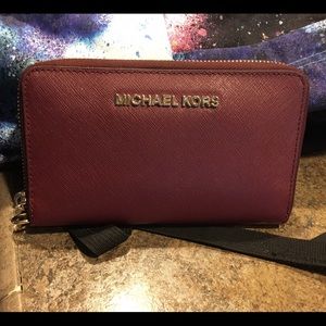 MK continental wristlet merlot