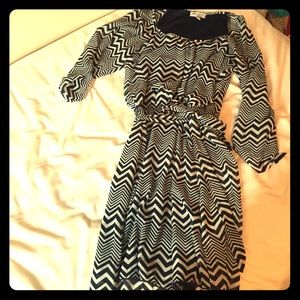 Dress with elbow length sleeves and knee length