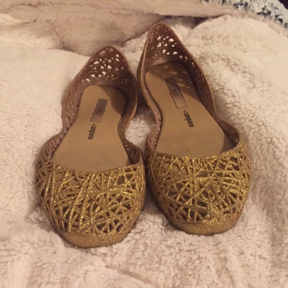 Melissa and Campana gold glitter jelly flats
