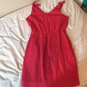 Coral pink dress with triangle cutouts
