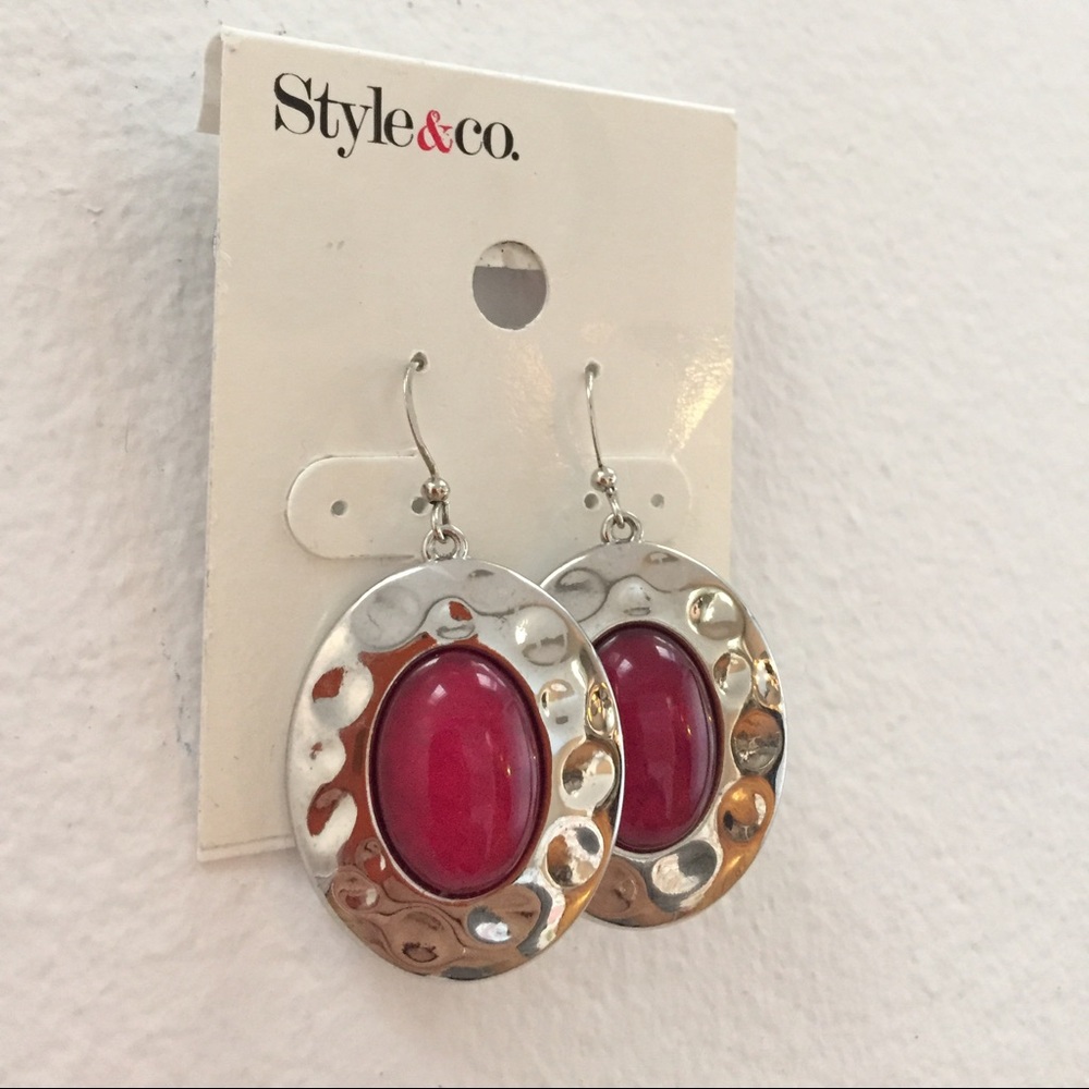 Silver tone dangle earrings with pink gemstones