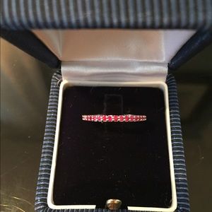 Lady's 14 karat white gold and ruby band.