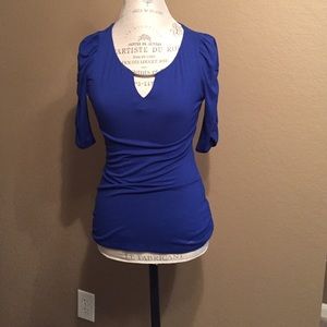 Blue top. Never worn