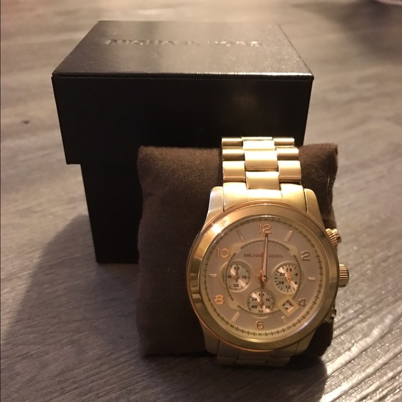 NWT Michael Kors Gold watch.
