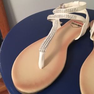 White gladiator sandals with rhinestones