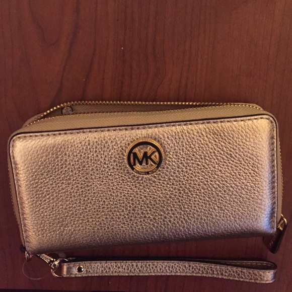 MK Wristlet meant to carry phones