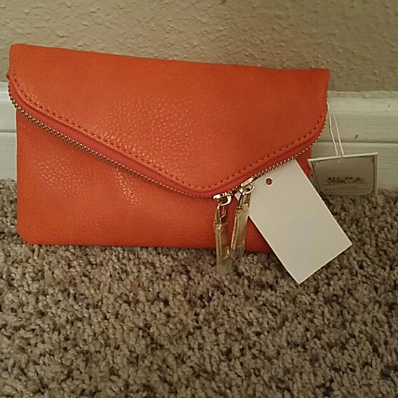 Orange leather clutch wristlet