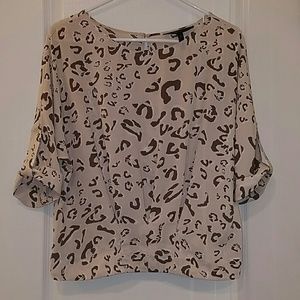 BCBG MaxAzria tan/brown leopard top size Small.