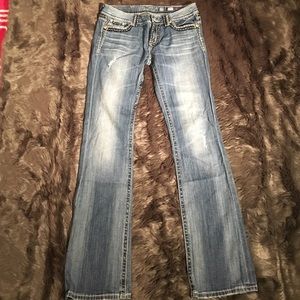 Light wash straight leg distressed Miss Me jeans