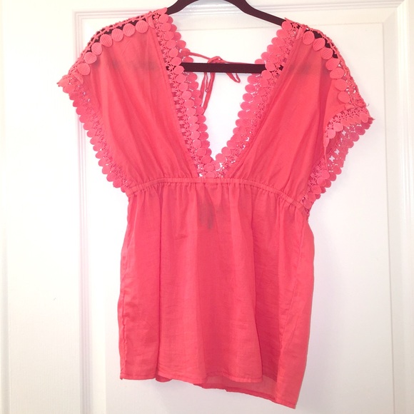 Beautiful coral blouse with detailing
