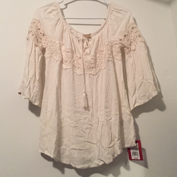 Off the shoulder cream shirt