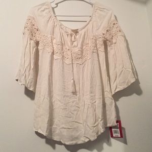 Off the shoulder cream shirt
