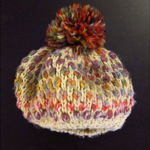 H&M: Multi-colored beanie with pom pom