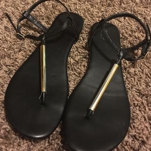 Black and gold sandals