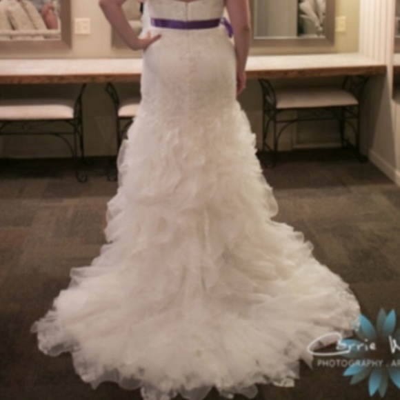 Beautiful ivory lace Casablanca wedding dress
