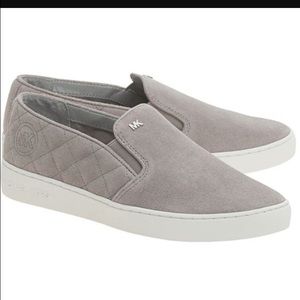 Micheal Kors "Keaton" suede slip on sneakers.