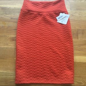 LLR Cassie size small orange quilted.