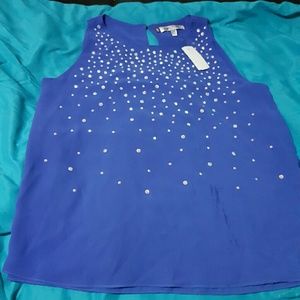 Jennifer Lopez blue top with rhinestones at front
