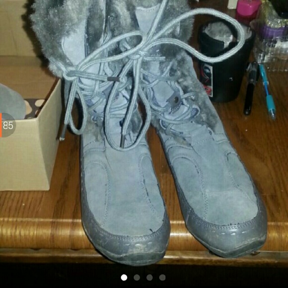 Like new tall North Face fur boots