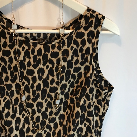Ali & Kris Tops - Ali & Kris Black and Tan leopard print peplum top Ali & Kris Tops - Ali & Kris Black and Tan leopard print peplum top