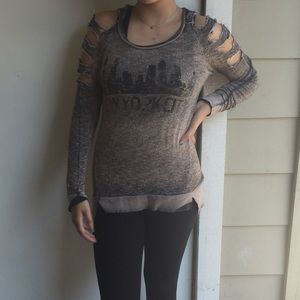 Edgy top with destressed cut outs