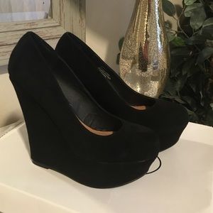 Steve Maddens "Pammyy" black suede wedges.