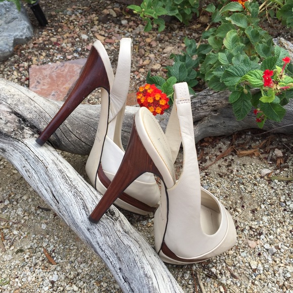 Beige spike heeled sling backs