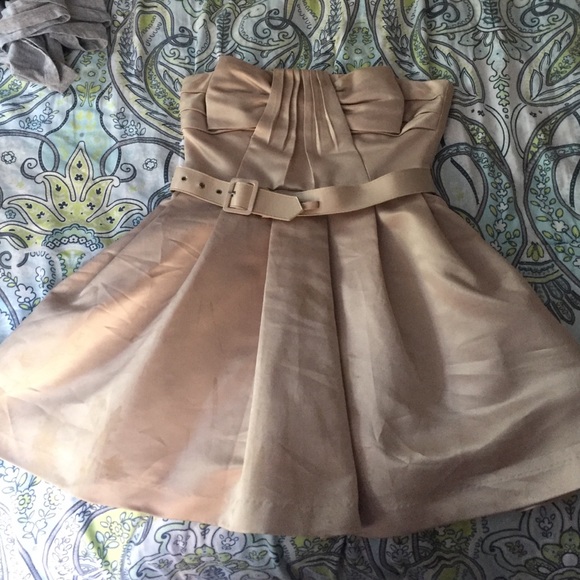 Tan short dress with belt.