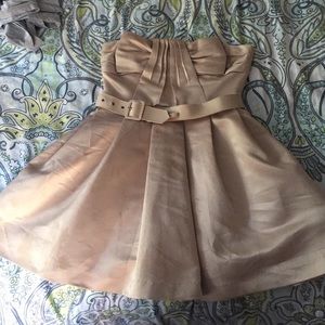 Tan short dress with belt.