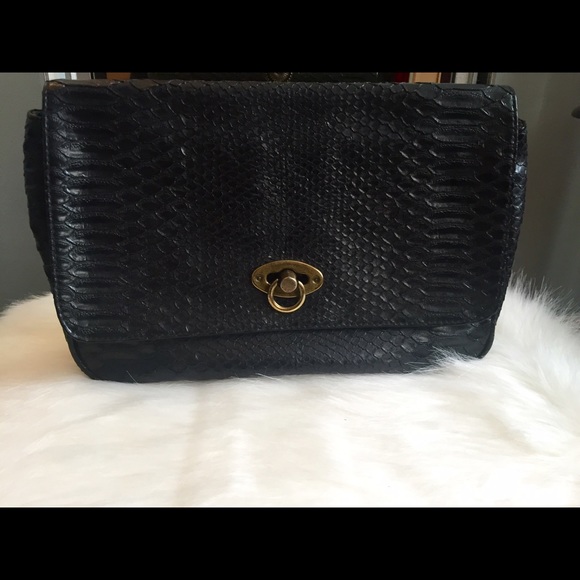 Black crocodile like clutch with gold hardware